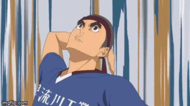a cartoon of a man wearing a blue shirt with chinese writing on it