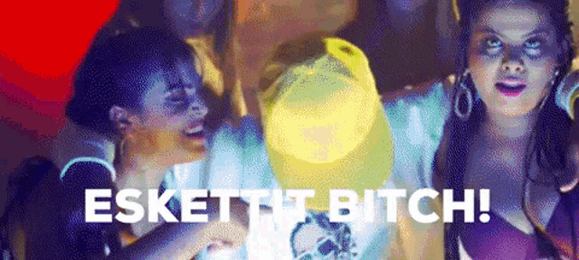 a group of people are standing next to each other with the words " esket it bitch " written in white letters
