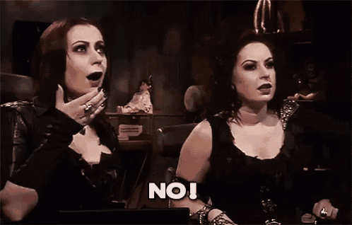 two women are sitting next to each other with one saying no
