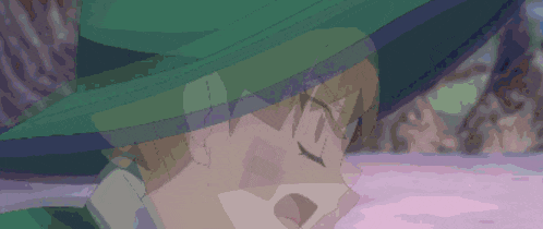 a pixelated image of a person with a green hat