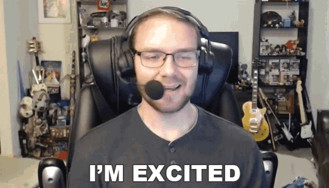 a man wearing headphones says i 'm excited