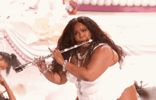 Playing Flute Lizzo GIF - Playing Flute Lizzo Bet Awards2020 GIFs