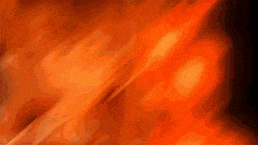 a blurred image of a person 's face against a red background