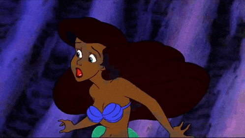 a cartoon illustration of a mermaid with red hair