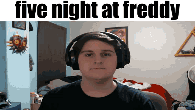 a man wearing headphones with the words five night at freddy on the bottom