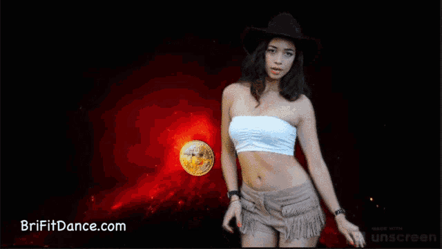 a woman is dancing in front of a bunch of coins and the website brifitdance.com is visible