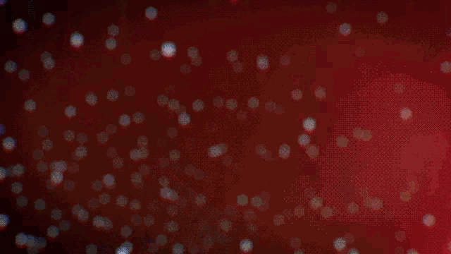 a blue object is flying through a red and blue background
