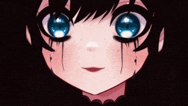 a close up of a girl 's face with tears coming out of her eyes
