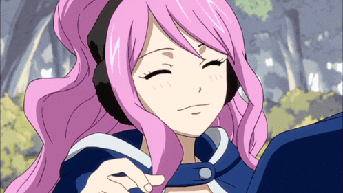 a girl with pink hair is wearing headphones and a blue cape