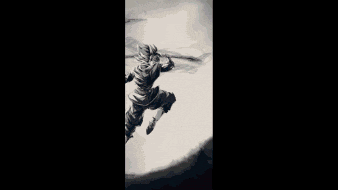 a black and white photo of a person flying through the air