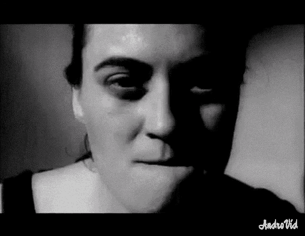 a woman 's face is shown in a black and white photo with the words andrevid at the top