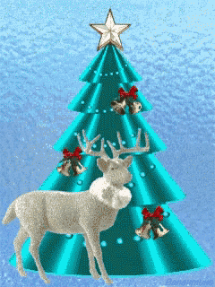 a deer standing in front of a christmas tree