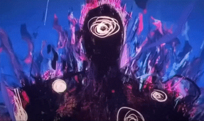 a computer generated image of a person with a glowing eye surrounded by purple and pink swirls