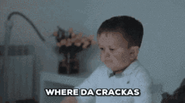 a little boy with his arms outstretched and the words where da crackas behind him