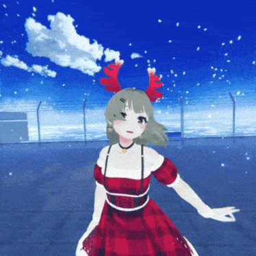a girl in a red plaid dress with reindeer antlers on her head
