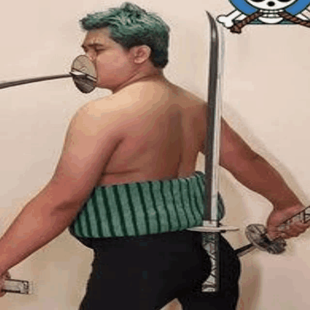 a man with green hair is holding two swords in front of a wall .