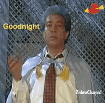 a man is wearing a cape and tie and the words goodnight are above him