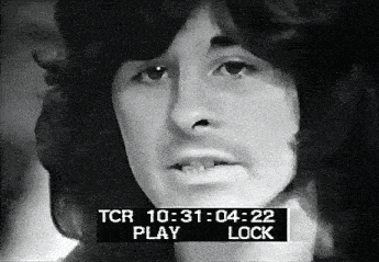 a black and white photo of a man 's face with a timer that says tcr 10:31 04:22