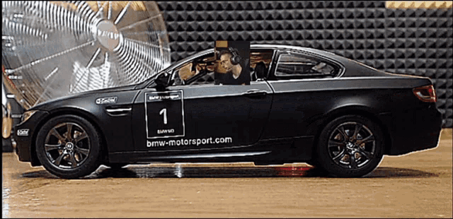 a car with the number 1 on the side