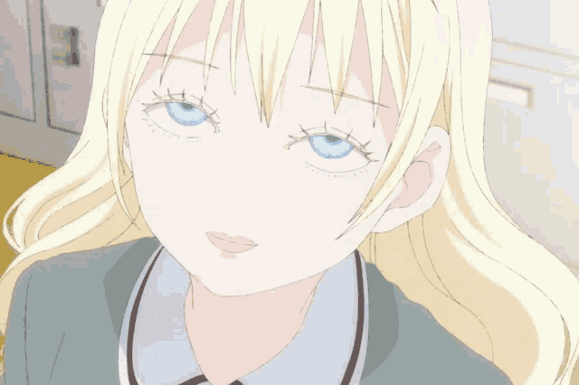 a girl with a blue face has her eyes closed