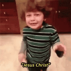 a young boy in a striped shirt is saying jesus christ