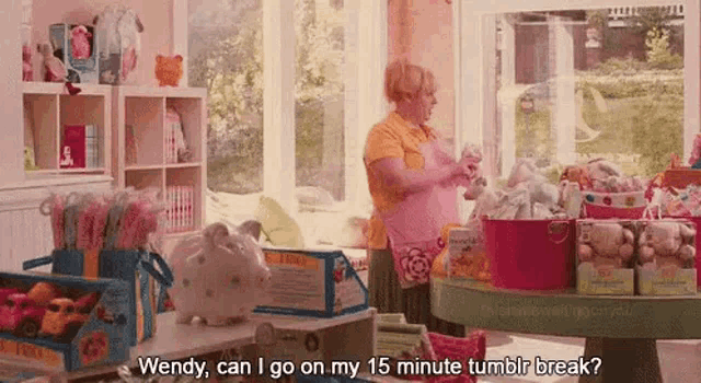 wendy can i go on my 15 minute tumblr break ? is a woman standing in a toy store .