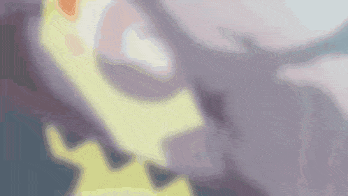 a close up of a cartoon character 's face and a purple background .