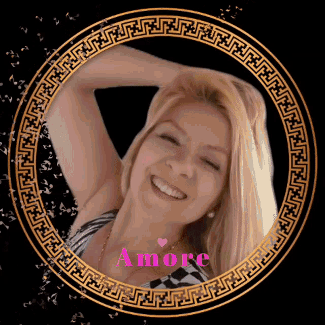 a woman is smiling in a gold circle with the word amore on it