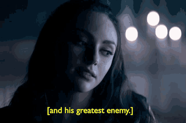 a woman in a dark room with the words " and his greatest enemy " above her