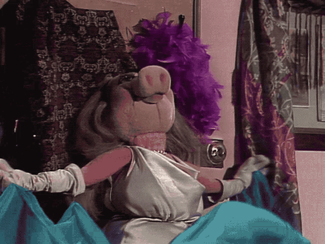 a pig wearing a white dress and gloves is standing in front of a door