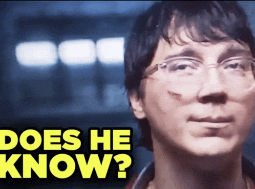 a close up of a man 's face with the words " does he know " above him