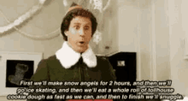a man in a elf costume is talking about making snow angels
