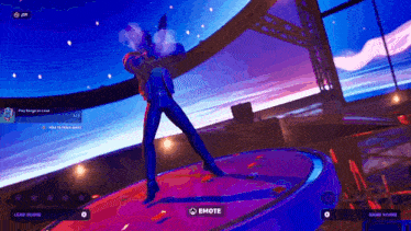 a man is dancing on a stage in a video game with the word emote on the bottom right