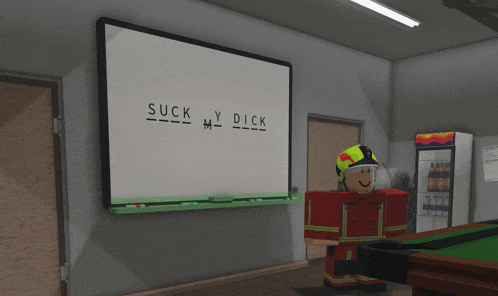 a white board with the words " suck my dick " on it
