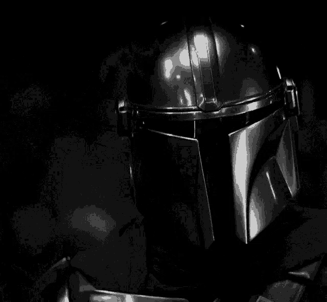 a close up of a helmet on a person 's head in the dark .