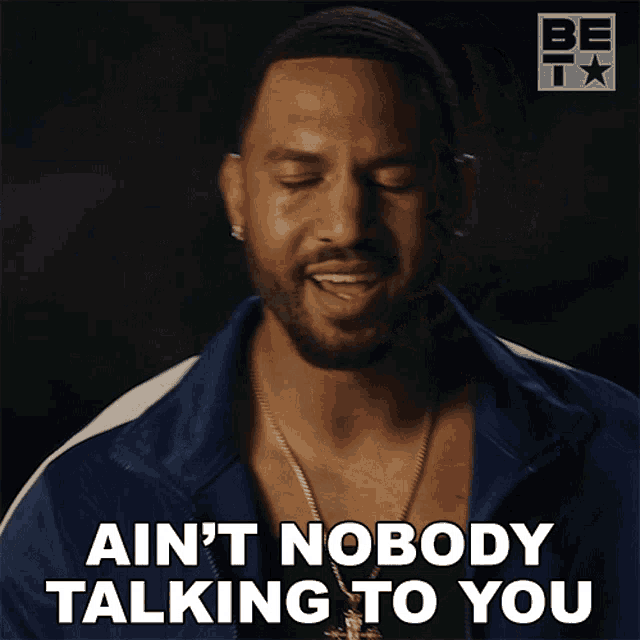 a man says " ain 't nobody talking to you " while wearing a blue jacket
