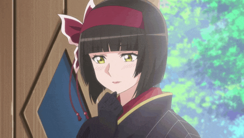 a girl with short black hair and a red headband on her head