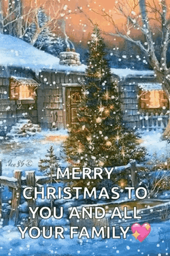 a merry christmas to you and all your family with a christmas tree in the snow