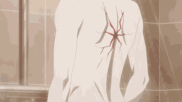 a person 's back with a spider on it