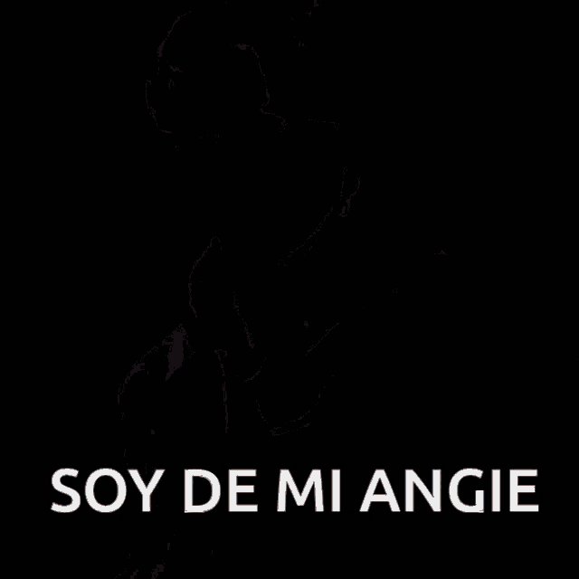 a man in a black hoodie with the words soy de mi angie written on the bottom .