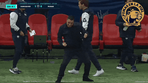 a soccer game is being played between vancouver and pumas and the time is 8:41