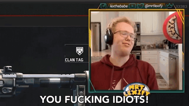 a man wearing headphones says you fucking idiots in front of a rifle