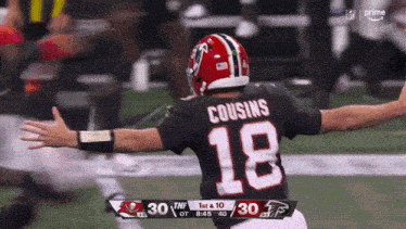 a football player with the number 18 on the back of his shirt