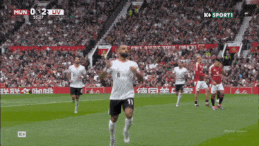 a soccer player with the number 11 on his shirt