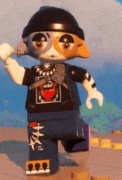 a lego figure is wearing a black shirt with a red skull on it
