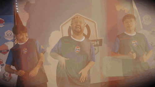 a man wearing a blue shirt that says cpl on the front