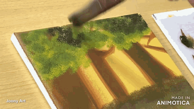 a painting by joony art is being made in animatica