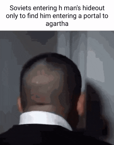 the back of a man 's head is shown in a meme .