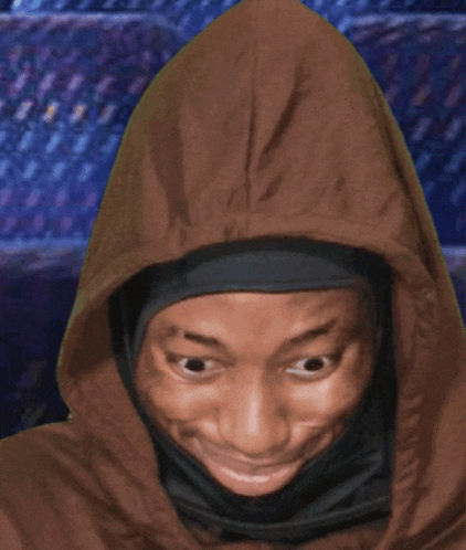 a close up of a person wearing a hood