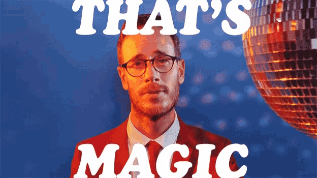 a man with glasses stands in front of a disco ball with the words that 's magic written above him
